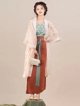 Women in Song Dynasty Hanfu three-piece outfit featuring a stylish green top, flowing robe, and long skirt.
