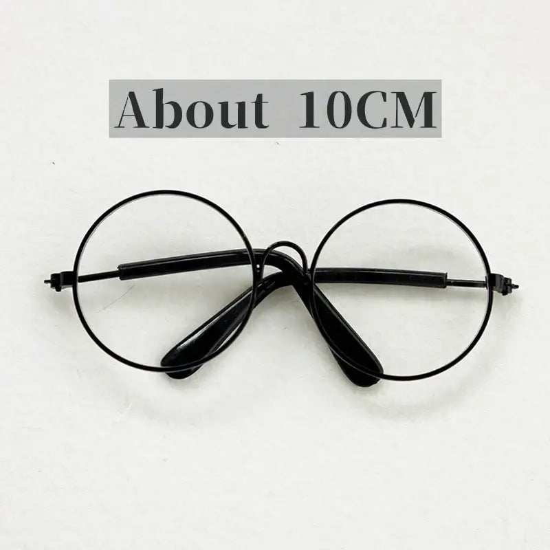 Round black baby glasses for newborn photography, measuring about 10CM, colorful unisex design, perfect for cute photo shoots.
