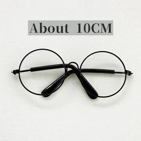 Round black baby glasses for newborn photography, measuring about 10CM, colorful unisex design, perfect for cute photo shoots.