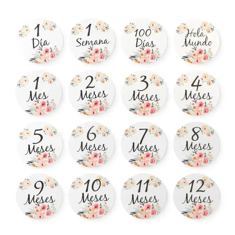 Set of 12 floral newborn memory cards for age milestones from 1 day to 12 months in English and Spanish.