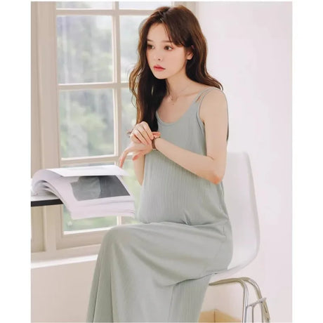 Sleeveless strap maternity dress in natural color, perfect for summer outdoor occasions and breastfeeding.