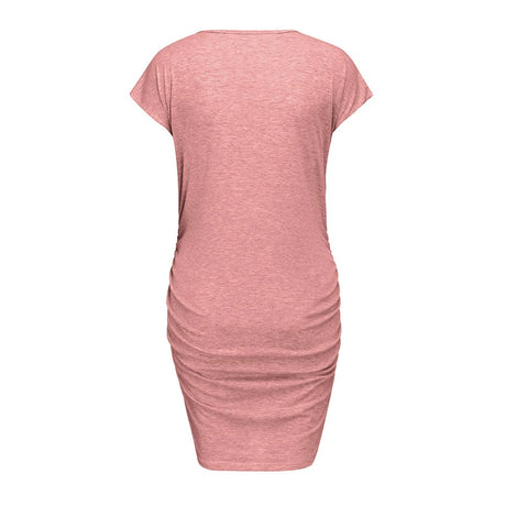 Back view of a loose casual maternity dress for plus size women, featuring a pink color and above-knee length.