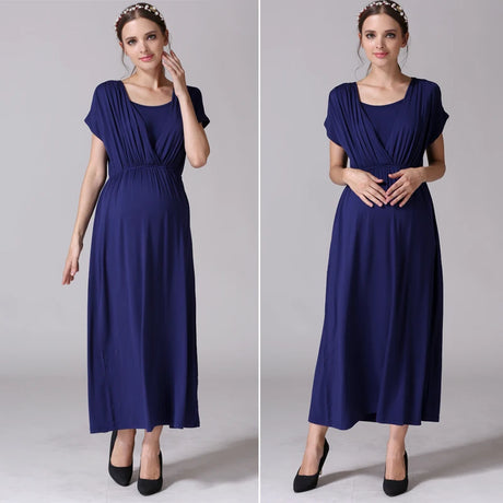 Soft fabric nursing maternity dress in navy blue, featuring a v-neck and flowing mid-calf length, ideal for breastfeeding.