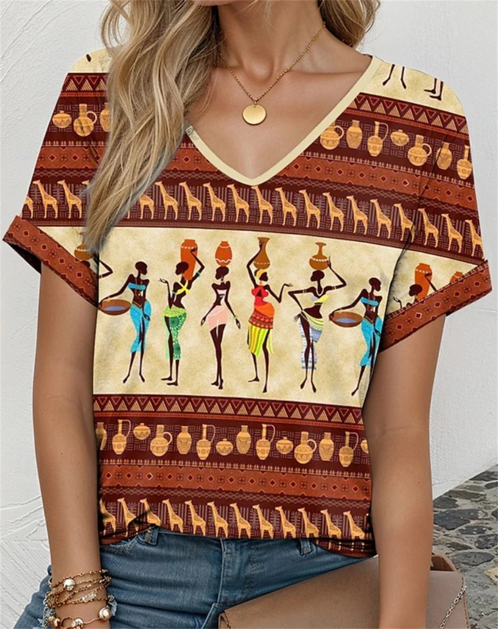 V-neck tee featuring vibrant African-inspired print with dancers and decorative patterns, perfect for casual wear.
