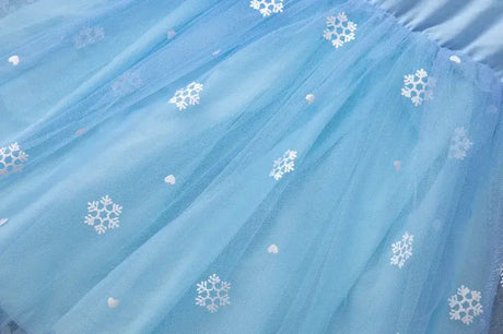 Light blue knee-length dress with snowflake and heart patterns, perfect for girls summer casual wear.