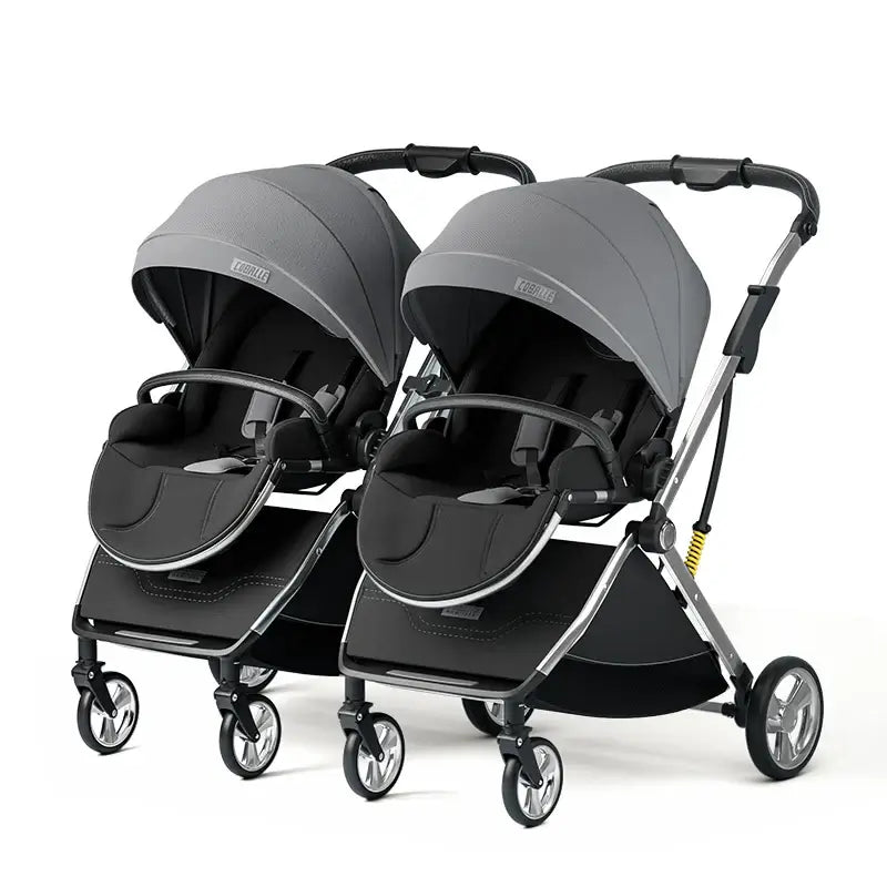 Twins baby stroller in gray featuring adjustable canopies and sturdy aluminum frame for ages 0-6 years.