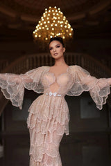 Elegant Arabic nude stone wedding gown with tiered sleeves and sweetheart neckline, featuring beaded details.