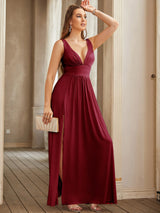 V-neck bridesmaid evening dress in burgundy, floor-length with a slit, showcasing a backless A-line silhouette.