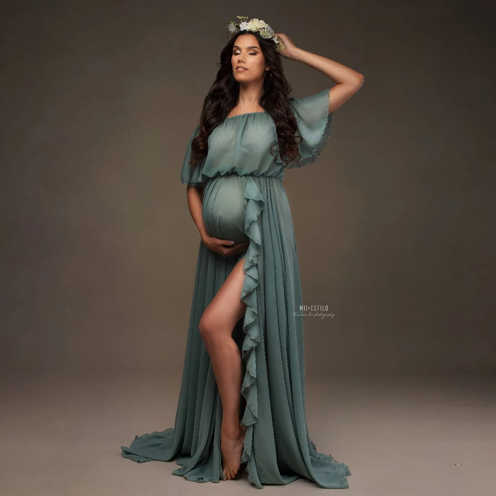 Chiffon ruffle sleeve maternity dress on a pregnant model, featuring a flowing ankle-length design in a soft blue-green color.