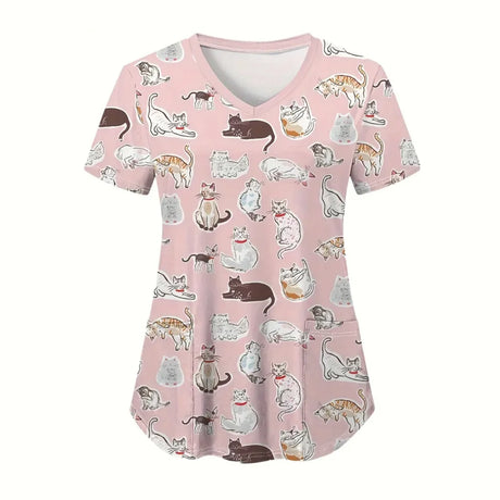 Women’s cartoon animal scrubs featuring playful cat patterns on a pink background, perfect for veterinary professionals.