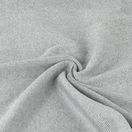 Close-up of soft, lightweight gray fabric for summer apparel, showcasing its stretch and texture.