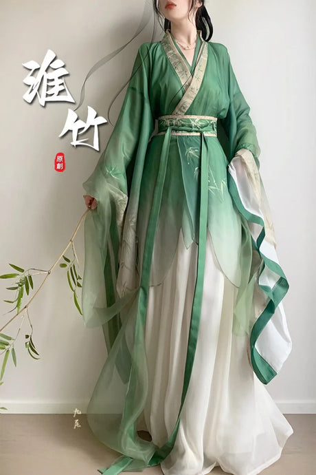 Bamboo Green Hanfu Dress, elegant traditional outfit for women, featuring flowing sleeves and vintage design for special occasions.