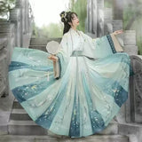 Hanfu traditional dress in light blue with floral patterns, perfect for parties and special occasions.