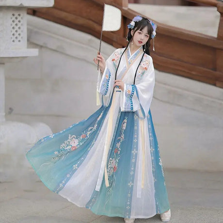 Hanfu traditional dress for women, featuring floral designs and flowing silhouette, ideal for party outfits or cultural events.