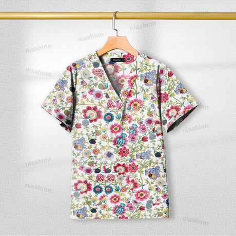 Printed short sleeve nursing scrub top for women, featuring a vibrant floral design and V-neckline, ideal for healthcare settings.