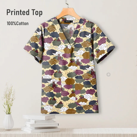 Colorful printed hospital surgical scrub top for women, made of 100% cotton, ideal for pediatric nursing uniforms.