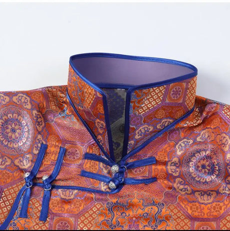 Mongolian ethnic women’s dress collar with intricate patterns in vibrant colors, showcasing traditional design.