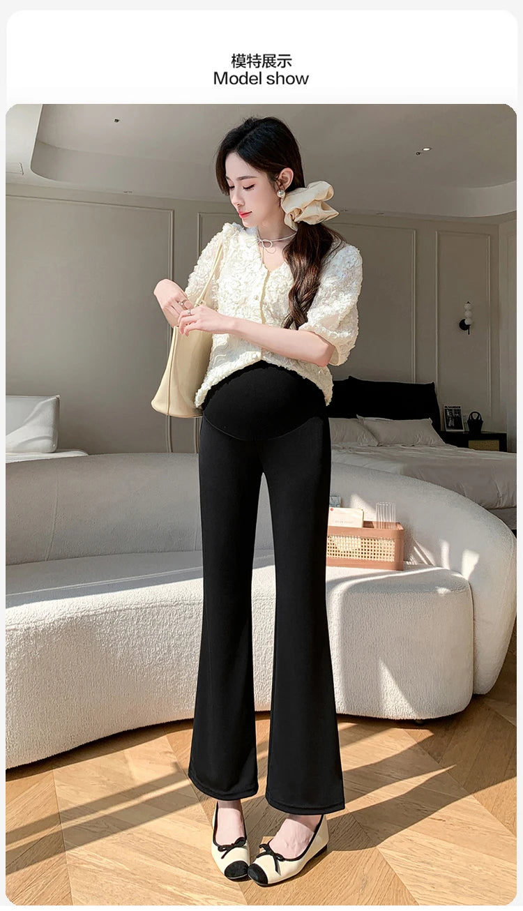 Model wearing Y2K Bootcut Maternity Pants in ice silk, styled with a chic top and accessories, showcasing comfort and style.