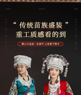 Miao embroidery festival costume showcasing traditional craftsmanship and vibrant designs, worn by women.