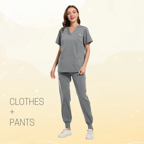 Women in a gray multicolor scrub set with short sleeve top and pants, suitable for medical and beauty settings.