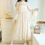 Woman wearing a floral 2-piece Hanfu summer dress in a light beige color, showcasing elegance and comfort.