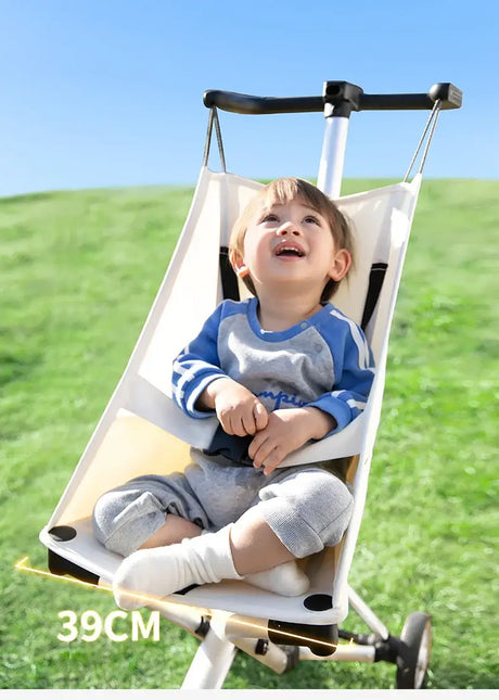 Lightweight travel stroller with a child sitting comfortably, enjoying the outdoors in a spacious seat.