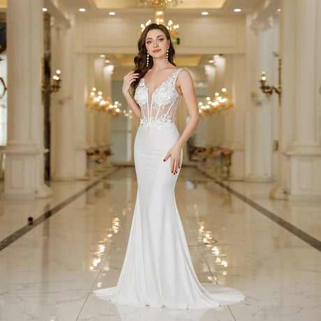 Elegant MisShow white mermaid wedding dress featuring lace and pearl details, floor-length design, perfect for bridal occasions.
