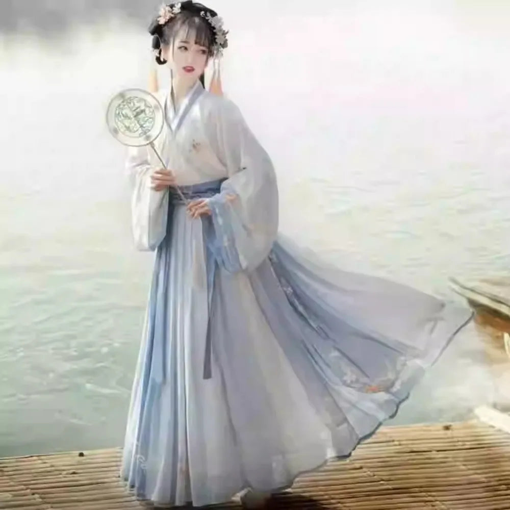 Hanfu traditional dress for women, elegant party outfit featuring flowing design and delicate details, made of polyester material.