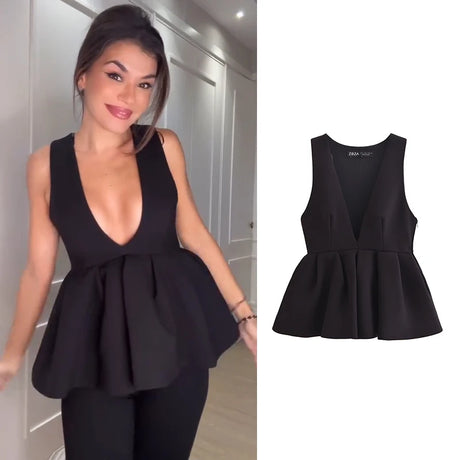 Elegant black V-neck tank top for women, featuring a peplum design, perfect for party wear and casual outings.