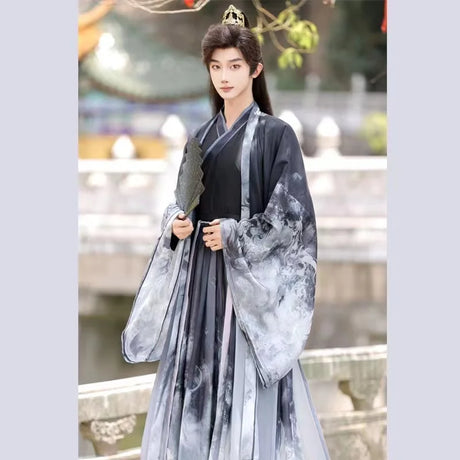 Men’s Martial Arts Hanfu outfit featuring a cross collar design, traditional ink motifs, and flowing sleeves.