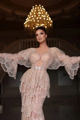 Elegant Arab nude stone wedding gown with tiered sleeves and beaded detailing, perfect for special occasions.