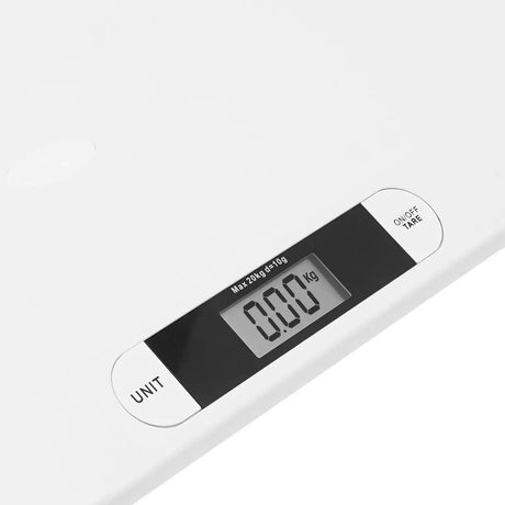 Close-up of an ergonomic digital baby scale display showing weight in kilograms, designed for easy baby weighing.