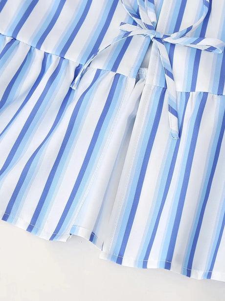 BowChic™ Stripe Lace-Up Blouse with blue and white stripes, featuring a lace-up front and short sleeves.