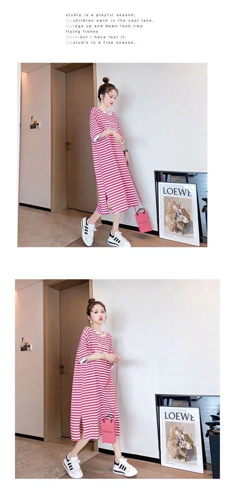 Striped maternity dress with boat neck and loose fit, styled with sneakers in a modern interior.