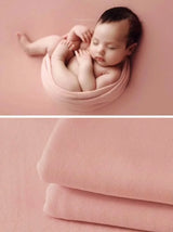 Newborn soft wrap blanket in soft pink, perfect for baby photography and cozy comfort, unisex design, chemical-free.