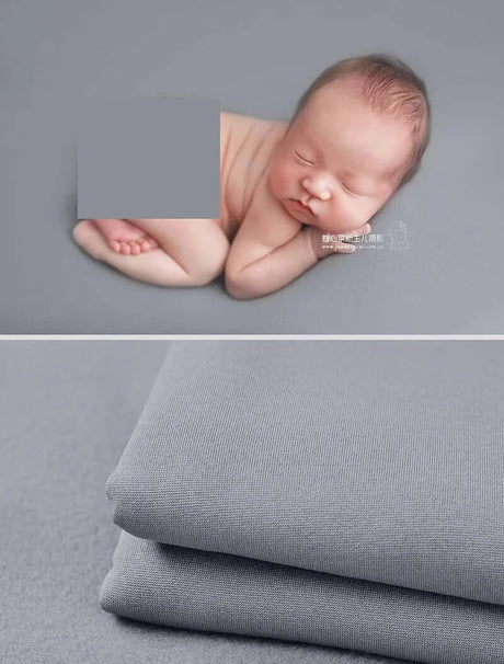 Newborn soft wrap blanket in light gray, perfect for newborn photography and cozy cuddles.