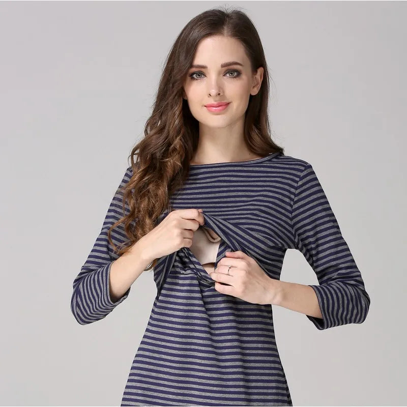 Postpartum nursing maternity dress with 3/4 sleeves, striped design, featuring breastfeeding access and natural colors.