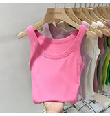 RibFlex™ Basic O-Neck Tank in pink, showcasing summer style and comfort with ribbed texture and stretchy fabric.