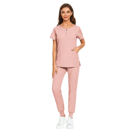 7-color nursing work uniform in pink, featuring zipper v-neck pocket top and matching pants, ideal for women.