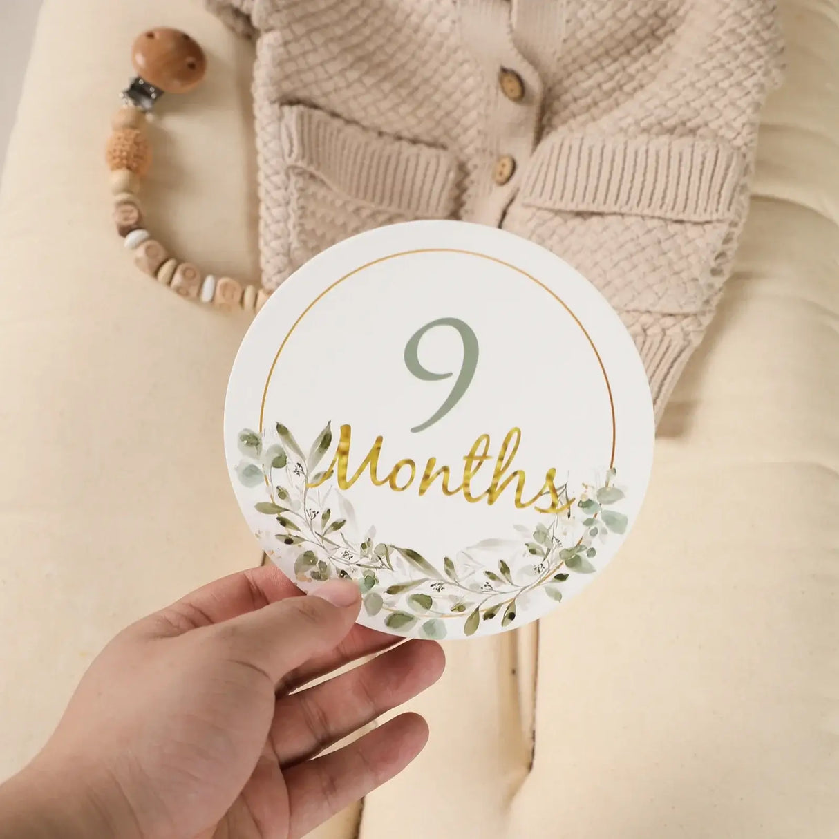 9-month milestone card featuring floral design, perfect for newborn baby photography and memory tracking.
