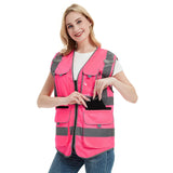 High visibility pink safety vest for women featuring reflective tape and multiple pockets, ideal for work uniform.