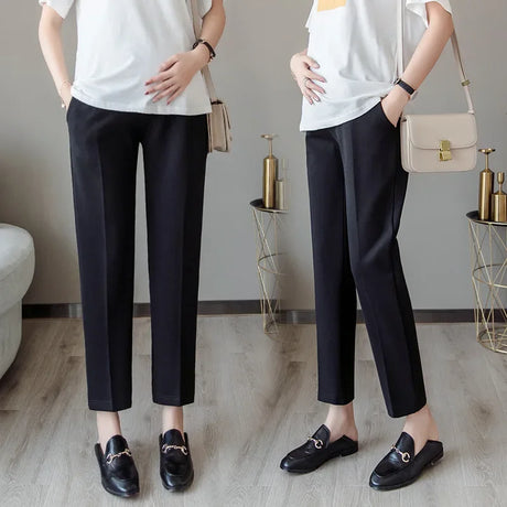 Formal black maternity pants for women, designed for summer work wear, featuring a straight fit and pockets.
