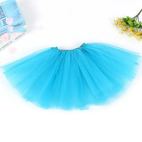 Blue tulle skirt for girls, perfect for parties and dress-up, made with soft materials for comfort and style.