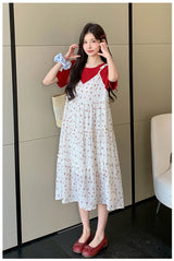 Floral two-piece maternity skirt in contrasting colors, featuring a relaxed A-line silhouette and short sleeves, perfect for summer.