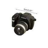Mini black camera for dollhouse, 1/12 scale photography prop, ideal for baby photo gifts and imaginative play.