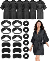 Set of black silky satin bride robes with matching accessories, perfect for wedding parties and bridesmaids.