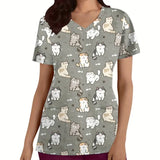 Women's short sleeve vet scrubs featuring a playful cartoon cat print in soft, breathable fabric.