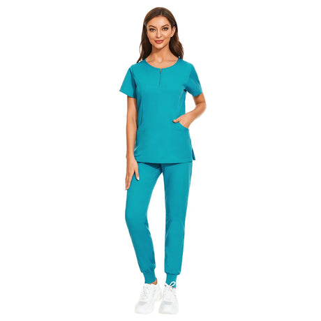 7-Color Nursing Work Uniform featuring zipper V-neck top and pants in turquoise, suitable for beauty salons and labs.