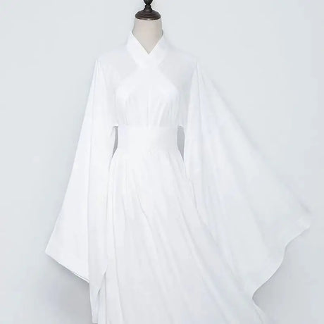 Elegant white Hanfu costume with wide sleeves, inspired by Tang Dynasty fashion for adults.