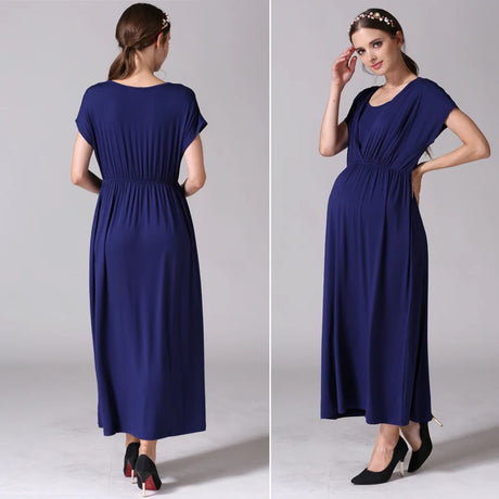 Soft fabric nursing maternity dress by Emotion Moms in navy, perfect for postpartum and breastfeeding.